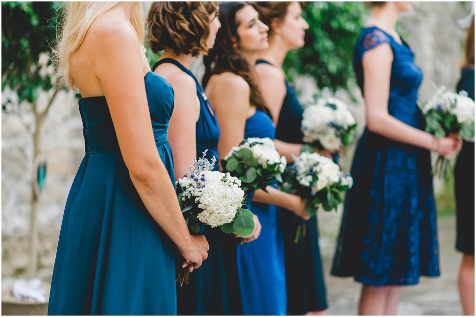 Bridesmaid holding their bouquets during the Goldie Mill Ruins wedding ceremony