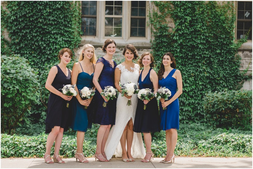 Bride and her bridesmaids in blue dresses at the University of Guelph