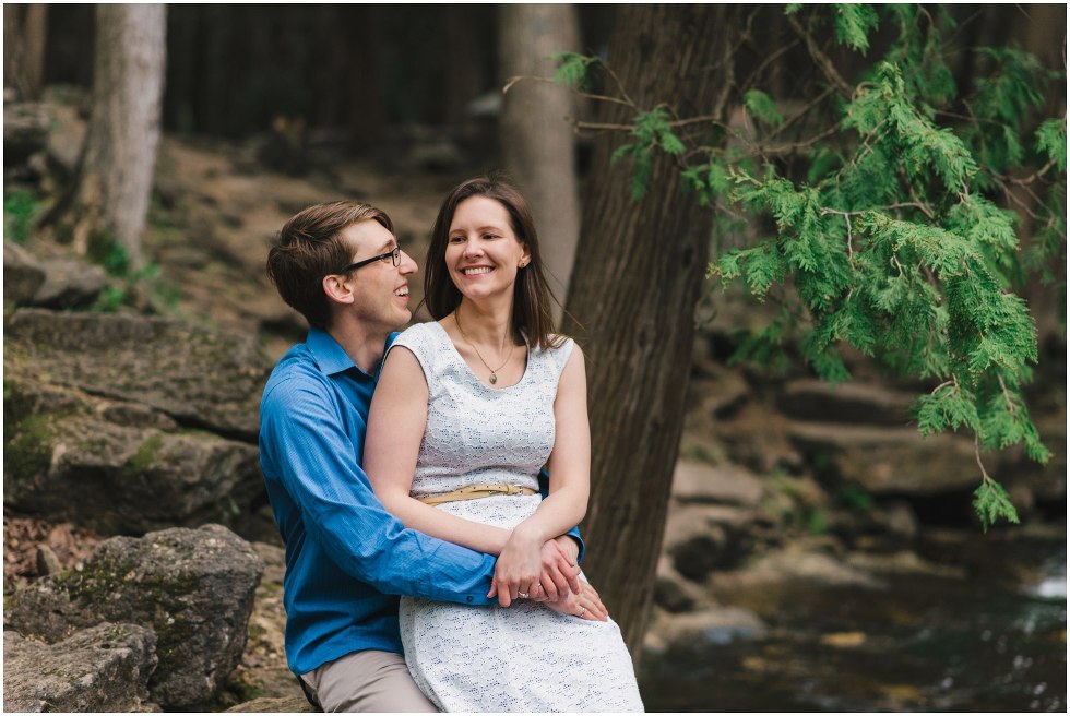 Man and woman laughing and hugging at Hilton Falls conservation area