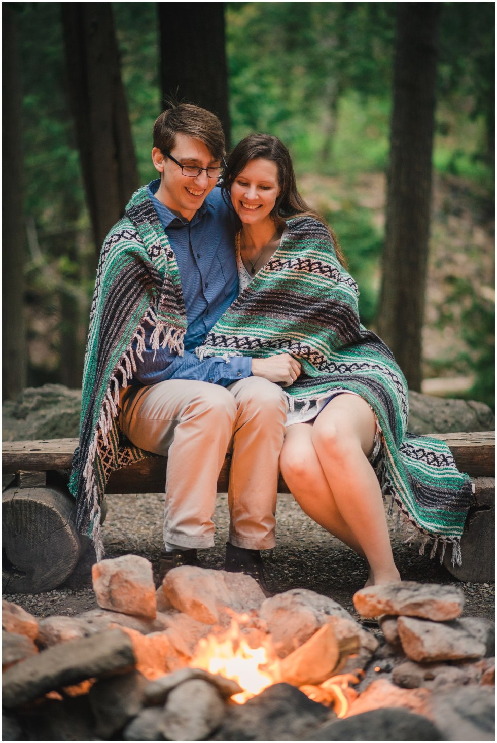 Couple enjoying the fire during their Hilton Falls engagement photos